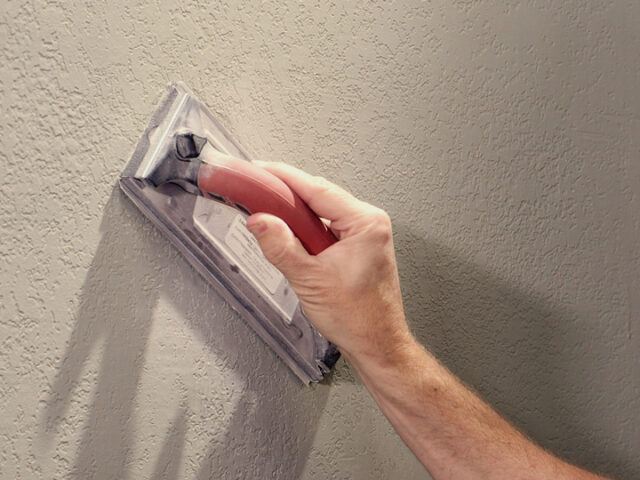 https://thedrywallmanllc.com/wp-content/uploads/2025/05/04_MT-Knock-Down-Repair-Stencils_Sanding-640x480.jpg